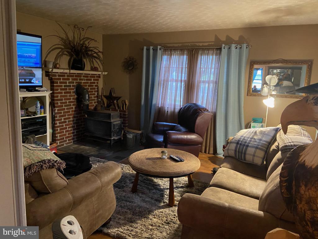 26016 Ridge Road Damascus, MD 20872 - Photo 19 of 27 Living Room - Wood Stove