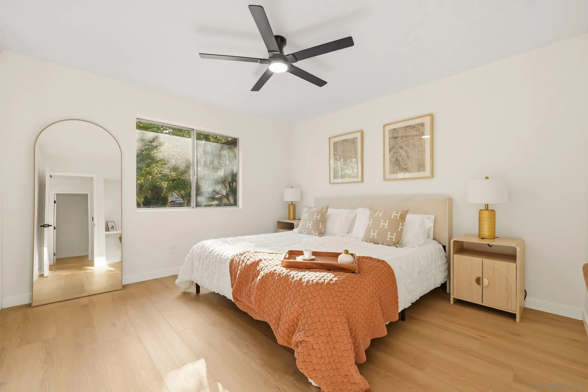 458 Ridgeway Court Spring Valley, CA 91977 - Photo 14 of 26 a bedroom with a bed and a large window