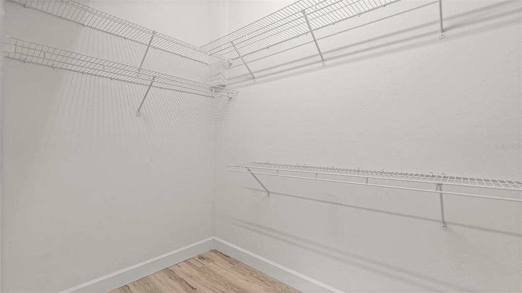 9428 Southwest 39 Avenue Gainesville, FL 32608 - Photo 33 of 43 a view of a room with racks on the wall