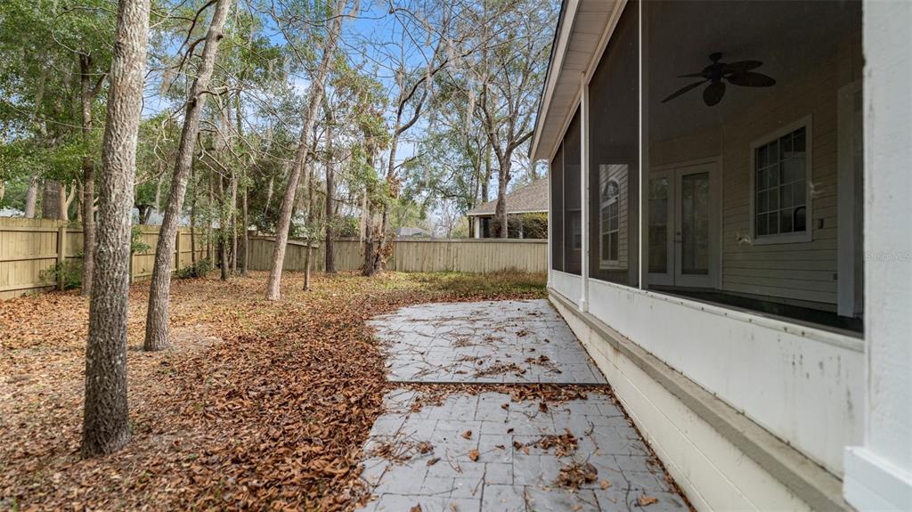 9428 Southwest 39 Avenue Gainesville, FL 32608 - Photo 40 of 43 a view of a pathway both side of the house