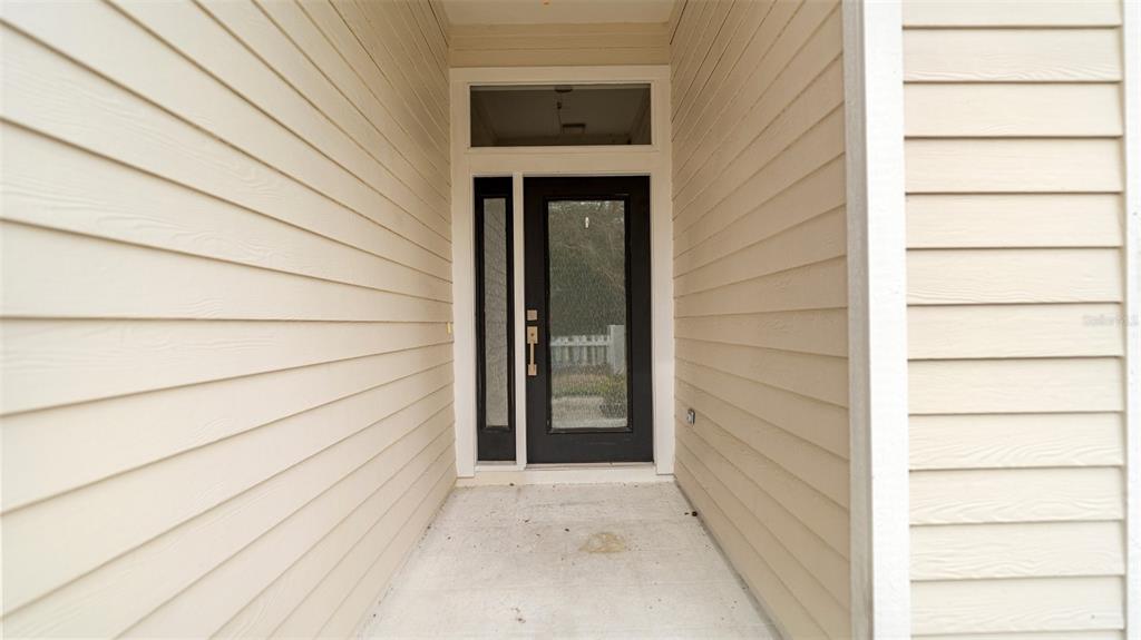 9428 Southwest 39 Avenue Gainesville, FL 32608 - Photo 4 of 43 a view of a door of the house