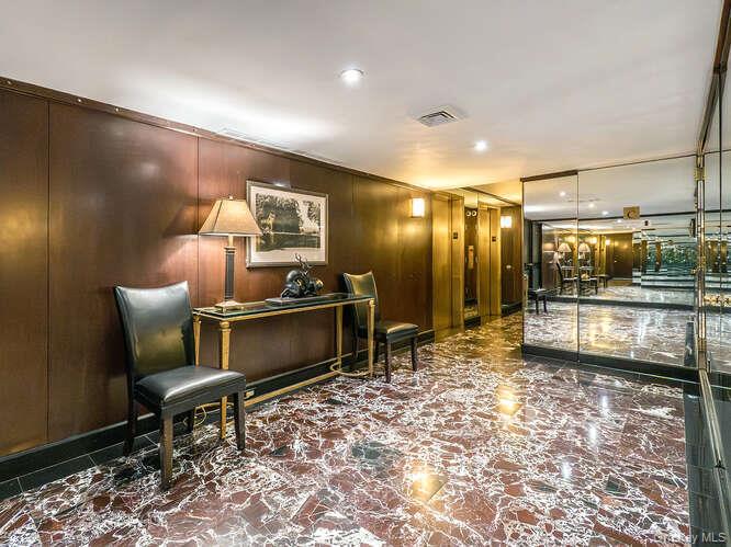 225 East 57th Street, Unit 1L Manhattan, NY 10022 - Photo 5 of 20 a living room with furniture