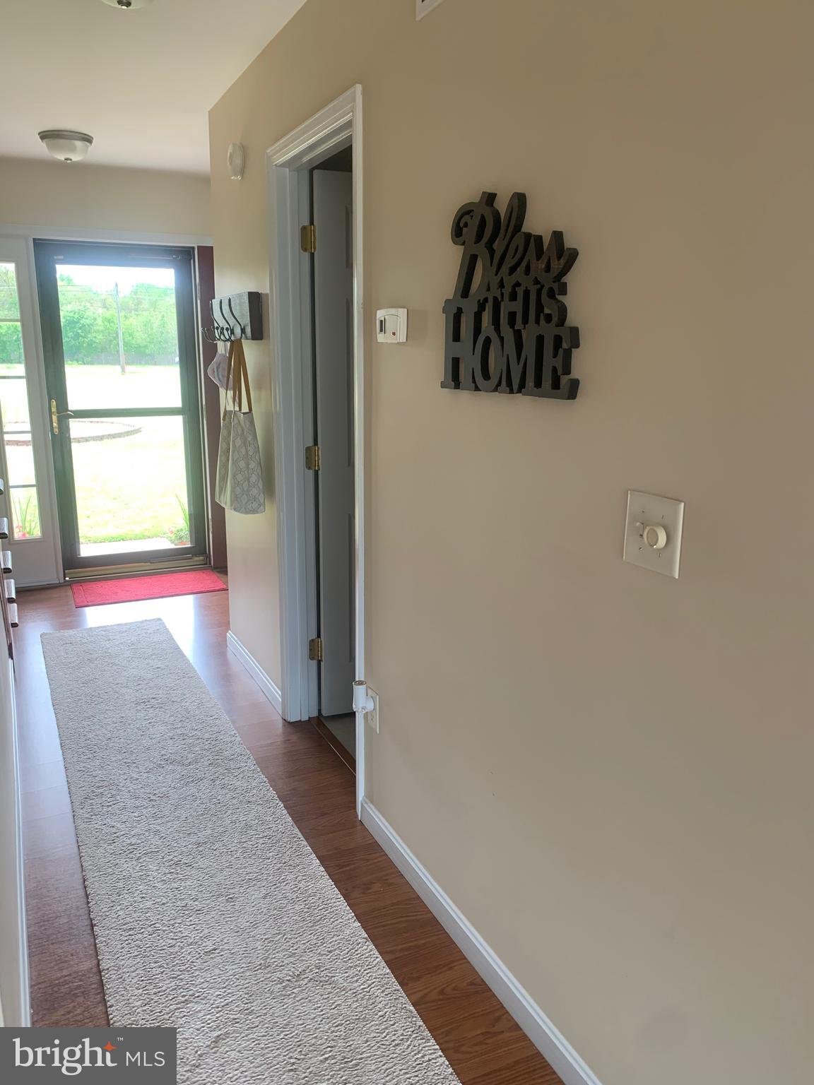 10937 Greensboro Road Denton, MD 21629 - Photo 24 of 25 hallway from kitchen to front door