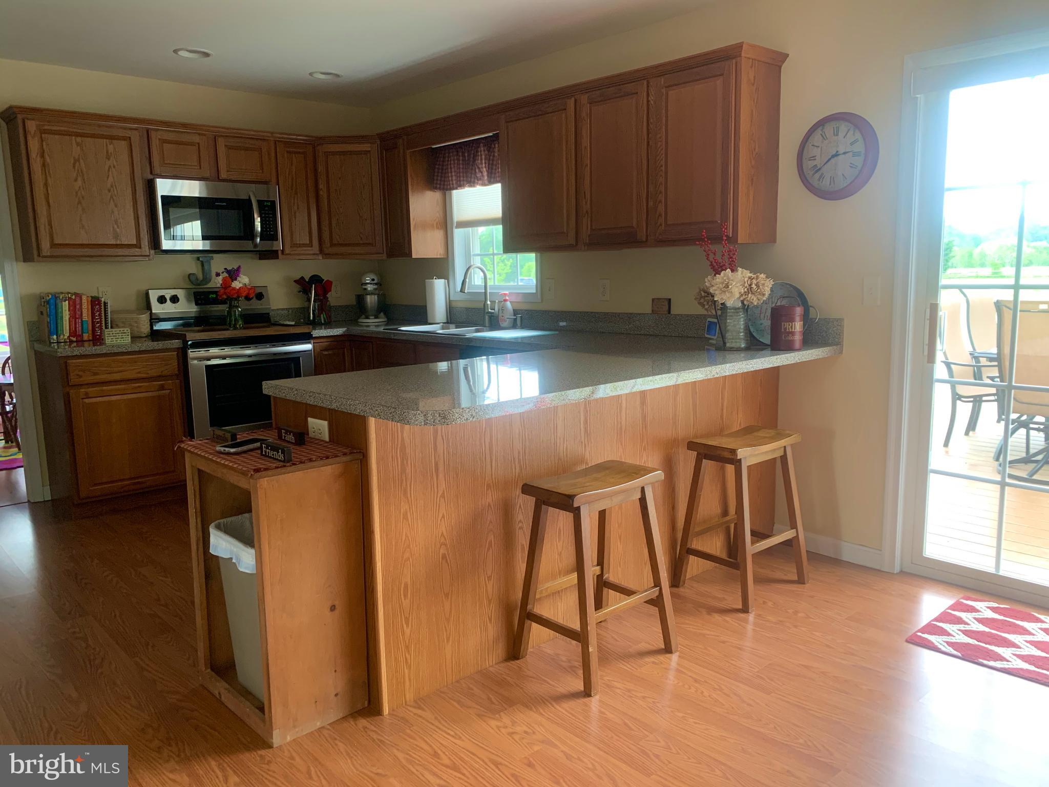10937 Greensboro Road Denton, MD 21629 - Photo 7 of 25 Kitchen with bar chair seating