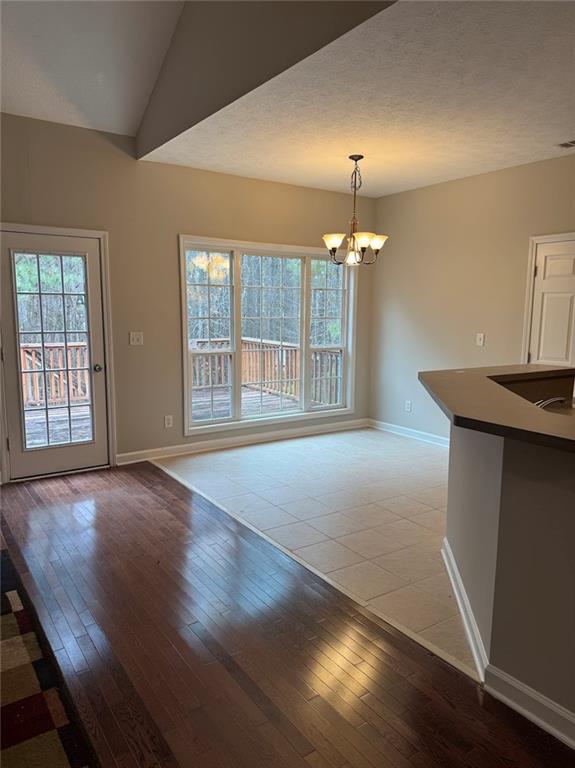 7025 Fletcher Drive Winston, GA 30187 - Photo 21 of 63 a view of an empty room with wooden floor and a window