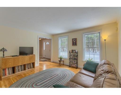 85 Chicopee Row Groton, MA 01450 - Photo 12 of 30 a living room with furniture and a wooden floor
