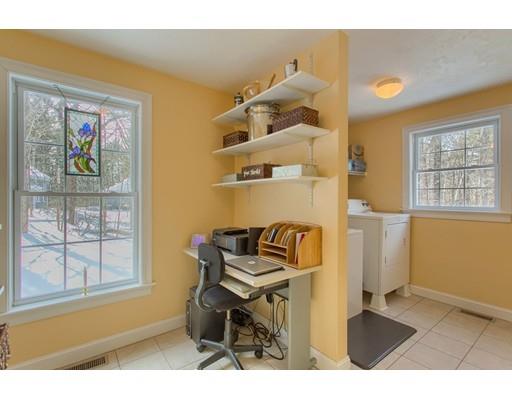 85 Chicopee Row Groton, MA 01450 - Photo 14 of 30 a living room with furniture and a window