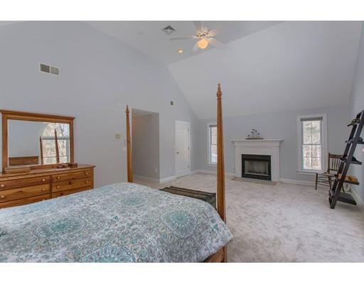 85 Chicopee Row Groton, MA 01450 - Photo 15 of 30 a living room with furniture and a fireplace