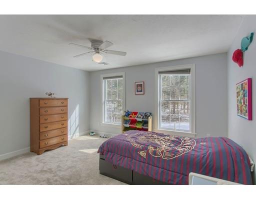 85 Chicopee Row Groton, MA 01450 - Photo 17 of 30 a bedroom with a bed and a window