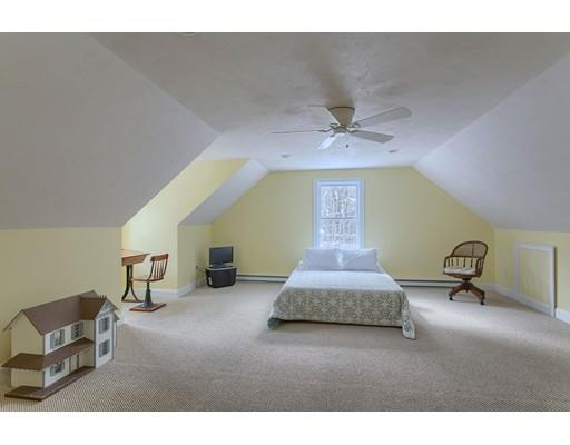 85 Chicopee Row Groton, MA 01450 - Photo 21 of 30 a living room with furniture and a chandelier
