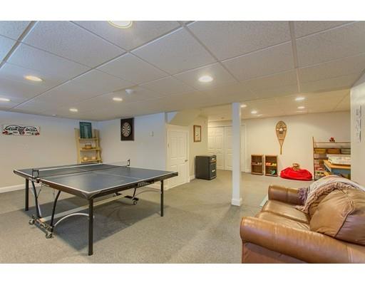85 Chicopee Row Groton, MA 01450 - Photo 22 of 30 a living room with furniture a table and kitchen view