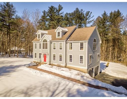 85 Chicopee Row Groton, MA 01450 - Photo 23 of 30 a front view of a house with a yard