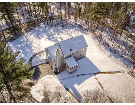 85 Chicopee Row Groton, MA 01450 - Photo 25 of 30 a view of roof deck with table and chairs