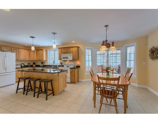 85 Chicopee Row Groton, MA 01450 - Photo 3 of 30 a outdoor dining space with furniture and kitchen view