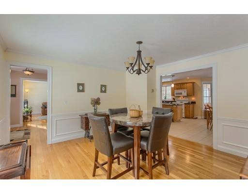 85 Chicopee Row Groton, MA 01450 - Photo 5 of 30 a view of a dining room with furniture and wooden floor