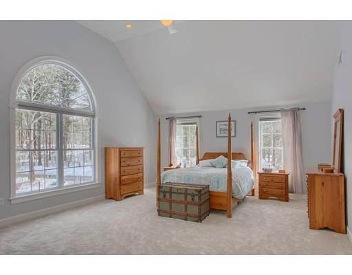 85 Chicopee Row Groton, MA 01450 - Photo 6 of 30 a bed room with a bed and a large window