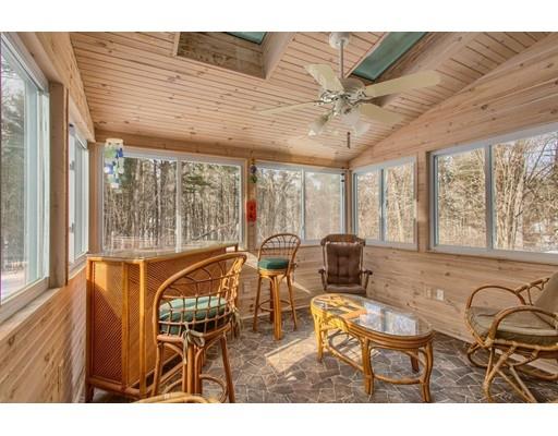 85 Chicopee Row Groton, MA 01450 - Photo 8 of 30 a balcony with furniture and wooden floor