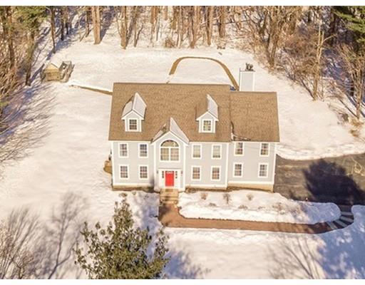 85 Chicopee Row Groton, MA 01450 - Photo 9 of 30 a front view of a house with a yard