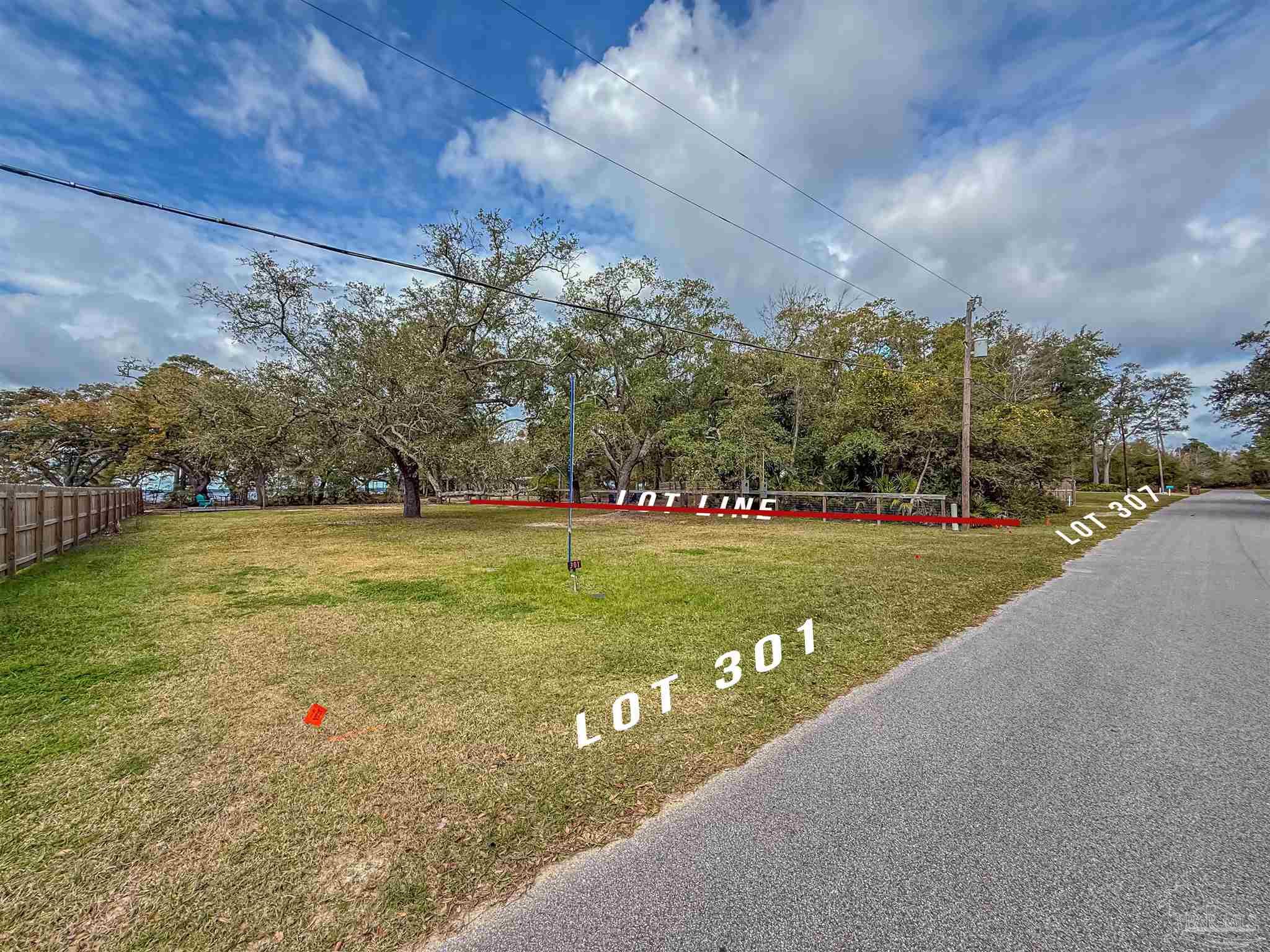 301 Katie Street Milton, FL 32583 - Photo 11 of 16 a view of a garden with an outdoor space
