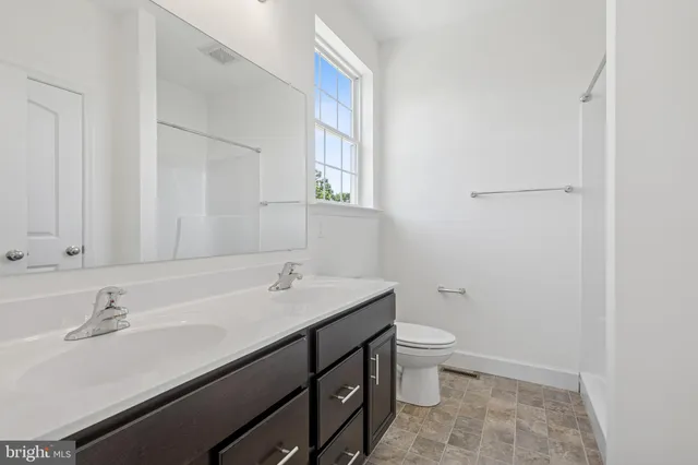a bathroom with a sink and a toilet