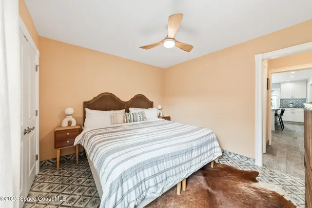 a bathroom with a sink mirror vanity and toilet