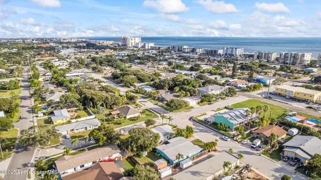 a view of a city with an ocean