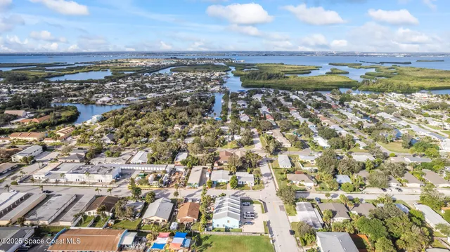 a view of a city with an ocean