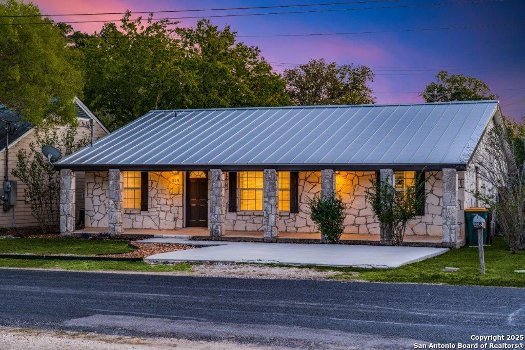 218 Ebner Street Boerne, TX 78006 - Photo 2 of 24 a front view of a house with a yard