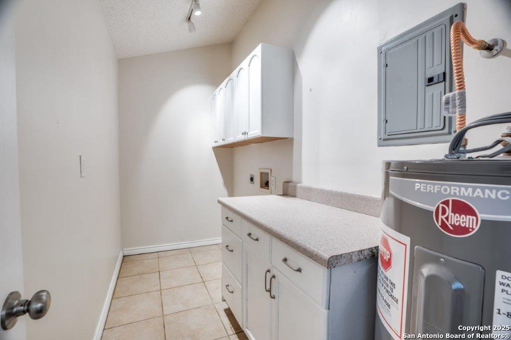 218 Ebner Street Boerne, TX 78006 - Photo 21 of 24 a utility room with washer and dryer