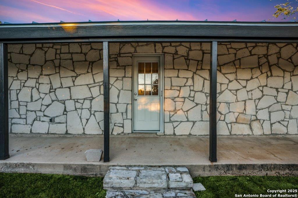 218 Ebner Street Boerne, TX 78006 - Photo 22 of 24 a view of a wooden door