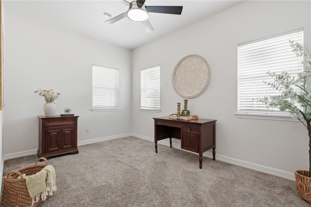 616 Colonial Drive Portland, TX 78374 - Photo 19 of 35 a room with a table chairs and a window