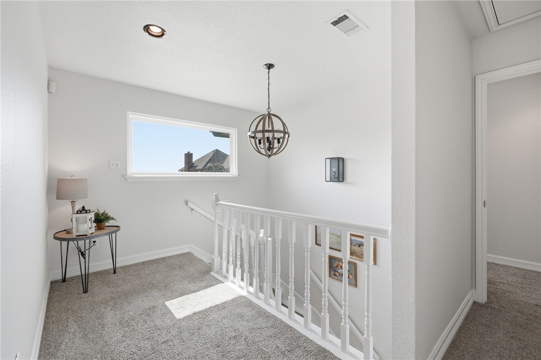 616 Colonial Drive Portland, TX 78374 - Photo 22 of 35 a view of a hallway with windows
