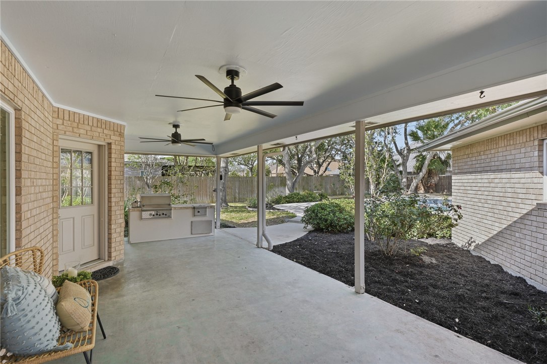 616 Colonial Drive Portland, TX 78374 - Photo 28 of 35 a view of a livingroom with a floor to ceiling window and stairs