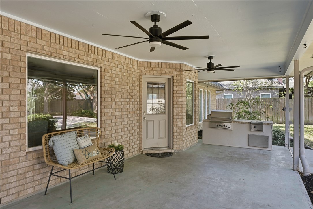 616 Colonial Drive Portland, TX 78374 - Photo 29 of 35 a room with chandelier fan and windows