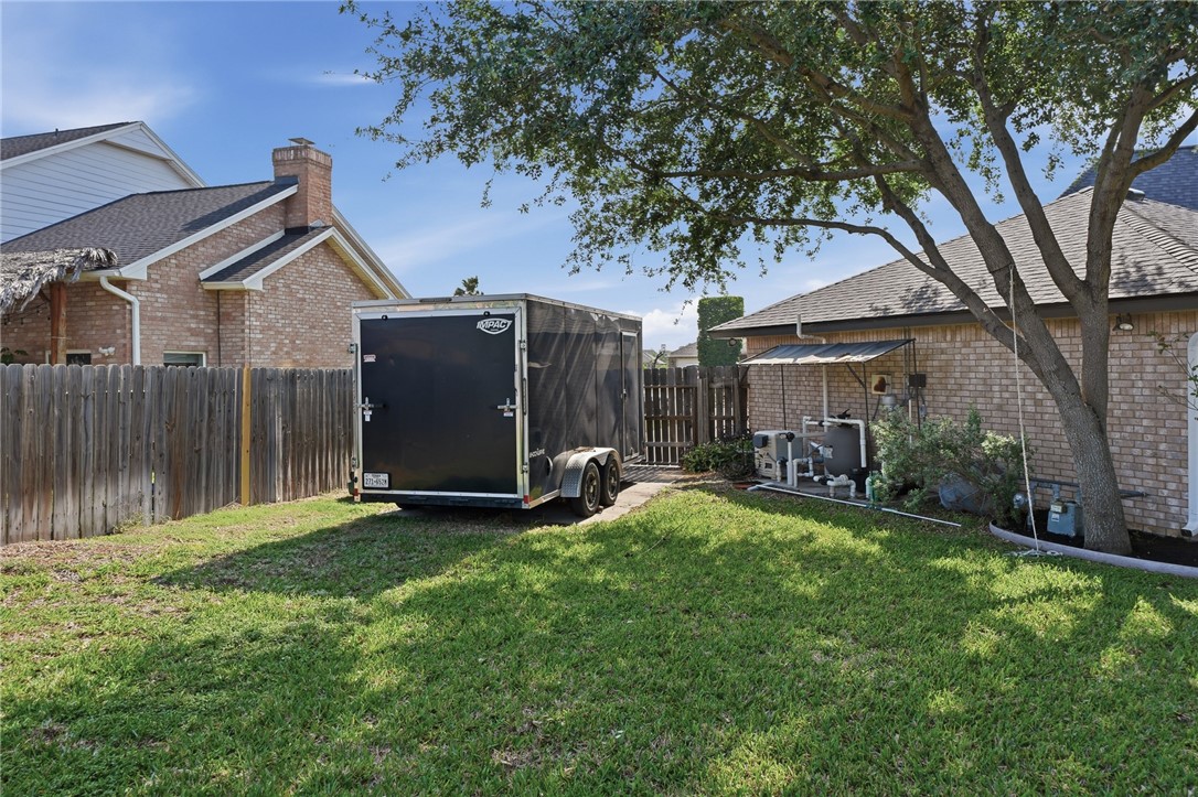616 Colonial Drive Portland, TX 78374 - Photo 34 of 35 a view of a house with backyard and a tree