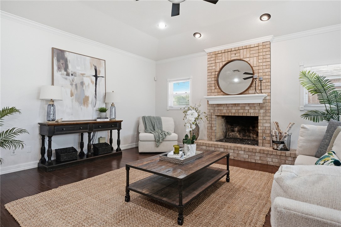 616 Colonial Drive Portland, TX 78374 - Photo 7 of 35 a living room with furniture and a fireplace