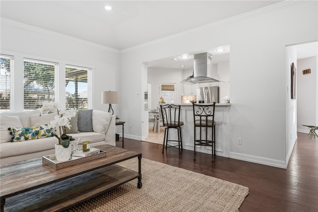 616 Colonial Drive Portland, TX 78374 - Photo 9 of 35 a living room with furniture a window and wooden floor