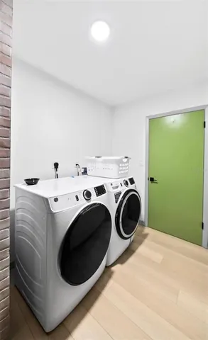 a utility room with dryer and washer
