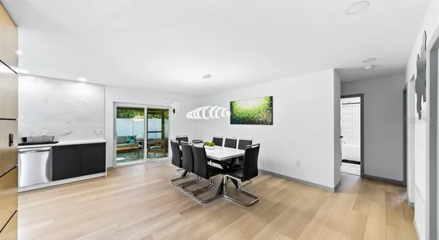 a workspace with furniture window and wooden floor