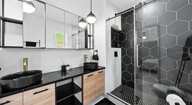 a kitchen with a sink and cabinets