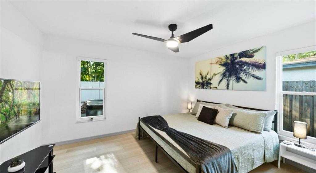 11123 117th Way Largo, FL 33778 - Photo 10 of 13 a bedroom with a bed and a window