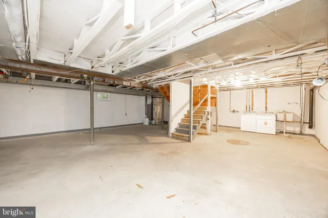 a view of a room with wooden walls