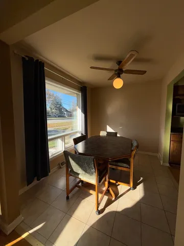 a workspace with furniture and a window