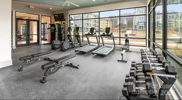 a view of a room with gym equipment