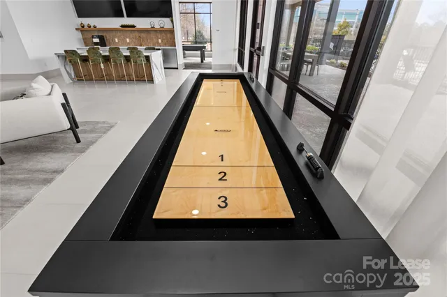 a view of swimming pool with seating area