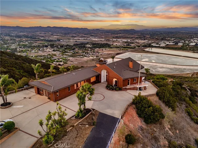 an aerial view of residential houses and city street
