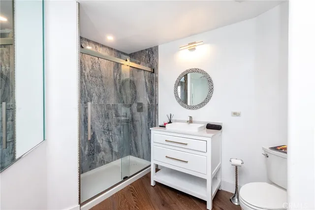 a bathroom with a bathtub and shower