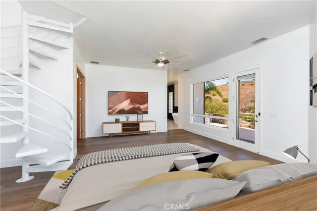 an entryway in a room with a large window