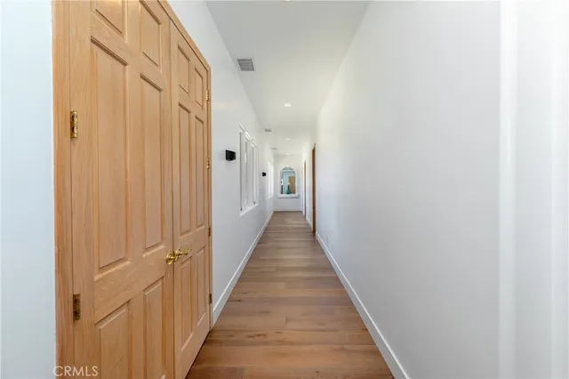 a view of a swimming pool with a lounge chair