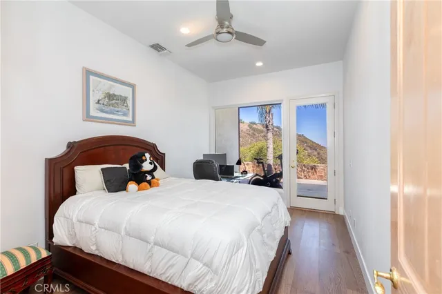 a view of a terrace with a table and chairs